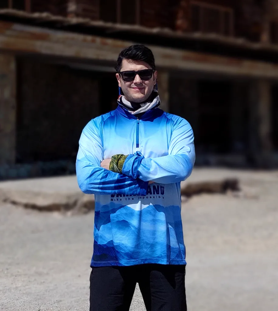 Arian Azmoudeh outdoors in sunglasses on a bright day